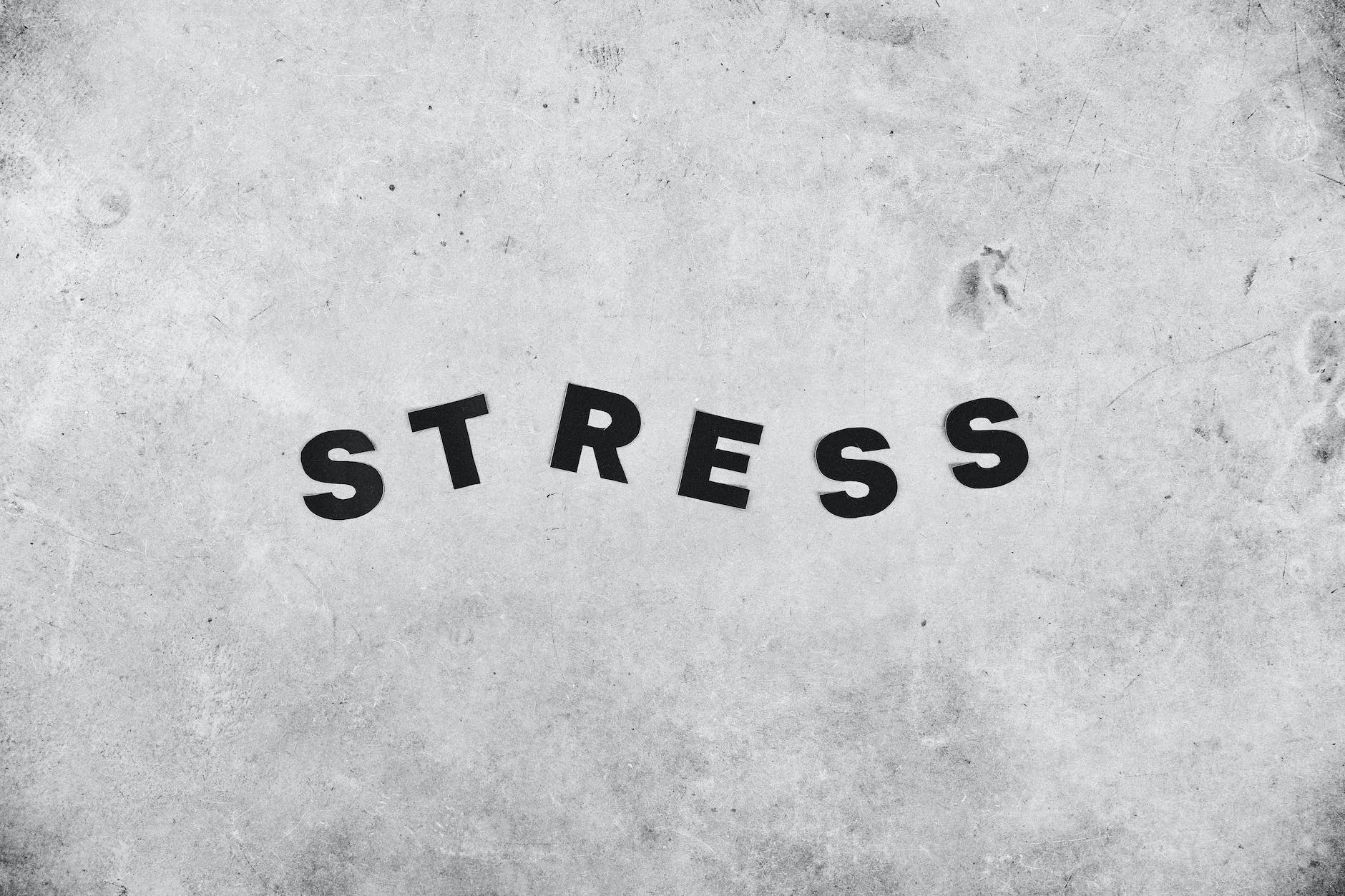 backdrop of stress inscription on rough wall